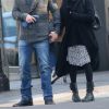 Exclusif - Shannen Doherty et son mari Kurt Iswarienko se promènent dans les rues de Paris le 18 mars 2016