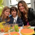 Exclusif - Sophie Thalmann et ses enfants Charlie et Mika lors d'un goûter de Pâques " Tout Chocolat " à l'Hôtel de Vendôme à Paris le 9 avril 2014.
