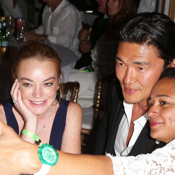 Lindsay Lohan, Rick Yune et Isabel dos Santos lors de la soirée d'anniversaire "Fawaz's Folies" pour les 64 ans de Fawaz Gruosi (de Grisogono) à la Cala di Volpe à Porto-Cervo, Sardaigne, Italie, le 8 août 2016. © Agence/Bestimage