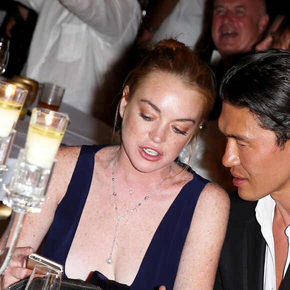 Lindsay Lohan et Rick Yune lors de la soirée d'anniversaire "Fawaz's Folies" pour les 64 ans de Fawaz Gruosi (de Grisogono) à la Cala di Volpe à Porto-Cervo, Sardaigne, Italie, le 8 août 2016. © Agence/Bestimage