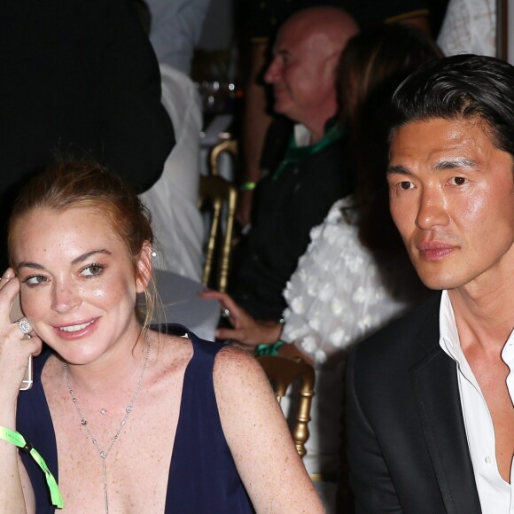 Lindsay Lohan et Rick Yune lors de la soirée d'anniversaire "Fawaz's Folies" pour les 64 ans de Fawaz Gruosi (de Grisogono) à la Cala di Volpe à Porto-Cervo, Sardaigne, Italie, le 8 août 2016. © Agence/Bestimage