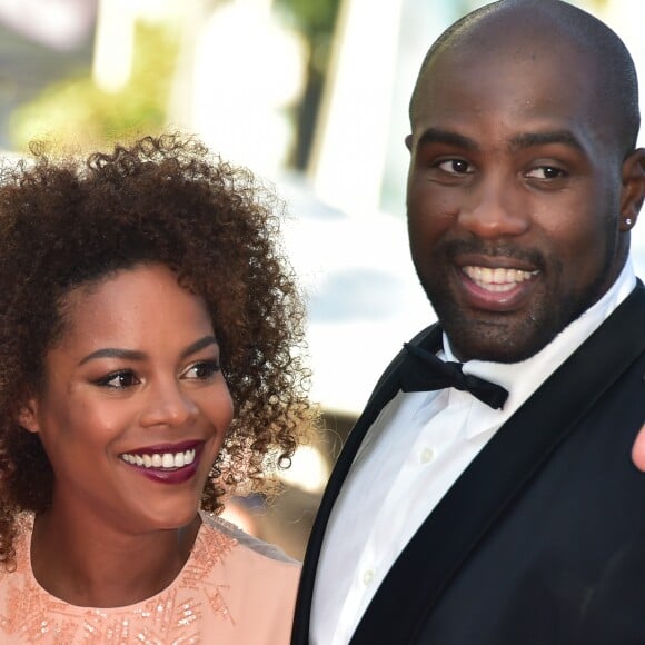 Teddy Riner et sa compagne Luthna - Montée des marches du film "Elle" lors du 69ème Festival International du Film de Cannes. Le 21 mai 2016. © Giancarlo Gorassini/Bestimage