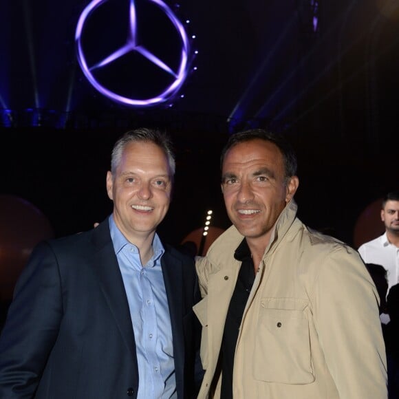 Exclusif - Marc Langenbrinck (Président directeur general de Mercedes-Benz France) et Nikos Aliagas - Exposition Mercedes-Benz "Les Belles Etoiles " au Grand Palais à Paris, France, le 12 juillet 2016. © Rachid Bellak/Bestimage