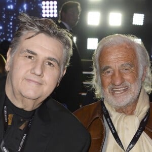 Pierre Ménès, Jean-Paul Belmondo - People au championnat du monde de Boxe WBA Lourds-légers Yunier Dorticos / Youri Kalenga à Paris le 20 mai 2016.