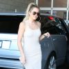 Les soeurs Kim et Khloe Kardashian à la sortie des studios Milk à Hollywood. Khloe porte une robe très moulante sans soutien gorge! Le 19 juillet 2016