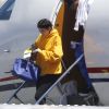 Kylie Jenner et son compagnon Tyga arrivent en Californie en provenance des Îles Turques-et-Caïques où elle a fêté ses 19 ans avec des amis le 13 août 2016.