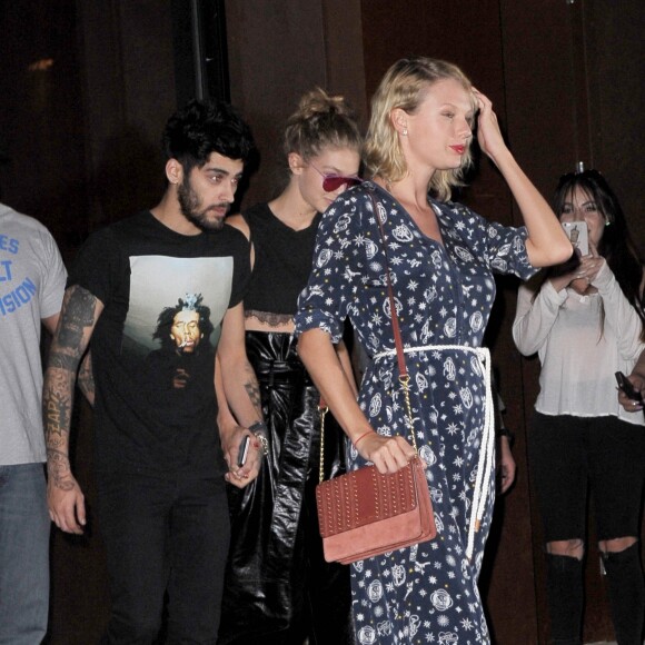 Taylor Swift à la sortie de l'appartement Gigi Hadid à New York. Gigi Hadid est avec son compagnon, le chanteur Zayn Malik. Le 12 septembre 2016