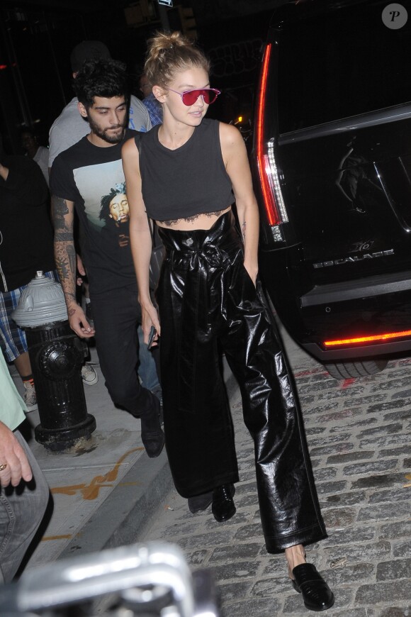 Taylor Swift à la sortie de l'appartement Gigi Hadid à New York. Gigi Hadid est avec son compagnon, le chanteur Zayn Malik. Le 12 septembre 2016