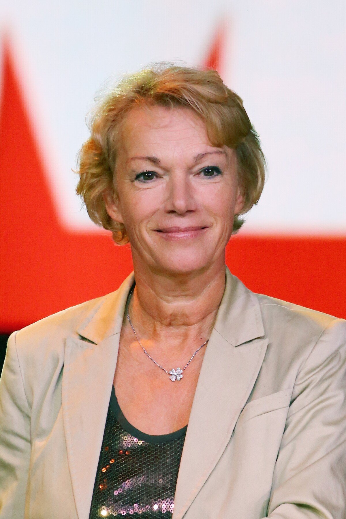 Photo : Brigitte Lahaie - Conférence de presse du groupe NextRadioTV qui  regroupe BFM TV et RMC à Paris le 2 septembre 2015. - Purepeople