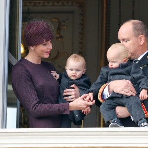 La princesse Charlène, sa fille la princesse Gabriella, le prince Albert II de Monaco et son fils le prince Jacques - La famille princière de Monaco au balcon du palais lors de la Fête Nationale monégasque le 19 novembre 2015. © Dominique Jacovides / Bruno Bébert / Bestimage