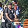 David Beckham, sa femme Victoria Beckham et leurs enfants Harper, Brooklyn, Romeo et Cruz s'amusent lors d'une journée en famille à Disneyland à Anaheim, le 24 août 2015