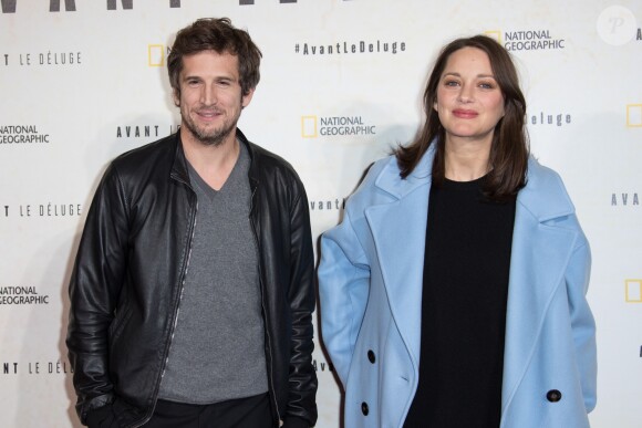 Marion Cotillard, enceinte, et son compagnon Guillaume Canet - Avant première du documentaire "Before the flood" au théâtre du Châtelet à Paris le 17 octobre 2016. © Cyril Moreau/Bestimage