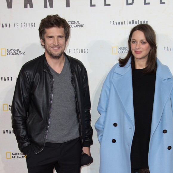 Marion Cotillard, enceinte, et son compagnon Guillaume Canet - Avant première du documentaire "Before the flood" au théâtre du Châtelet à Paris le 17 octobre 2016. © Cyril Moreau/Bestimage