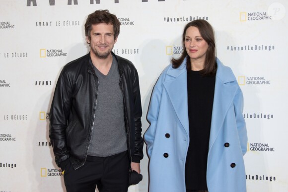 Marion Cotillard, enceinte, et son compagnon Guillaume Canet - Avant première du documentaire "Before the flood" au théâtre du Châtelet à Paris le 17 octobre 2016. © Cyril Moreau/Bestimage