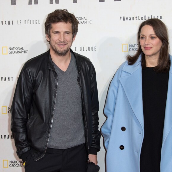 Marion Cotillard, enceinte, et son compagnon Guillaume Canet - Avant première du documentaire "Before the flood" au théâtre du Châtelet à Paris le 17 octobre 2016. © Cyril Moreau/Bestimage