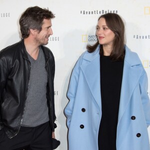 Marion Cotillard, enceinte, et son compagnon Guillaume Canet - Avant première du documentaire "Before the flood" au théâtre du Châtelet à Paris le 17 octobre 2016. © Cyril Moreau/Bestimage