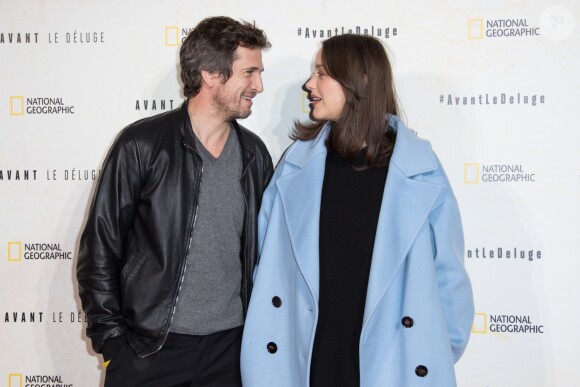 Marion Cotillard, enceinte, et son compagnon Guillaume Canet - Avant première du documentaire "Before the flood" au théâtre du Châtelet à Paris le 17 octobre 2016. © Cyril Moreau/Bestimage