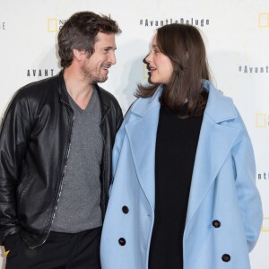 Marion Cotillard, enceinte, et son compagnon Guillaume Canet - Avant première du documentaire "Before the flood" au théâtre du Châtelet à Paris le 17 octobre 2016. © Cyril Moreau/Bestimage