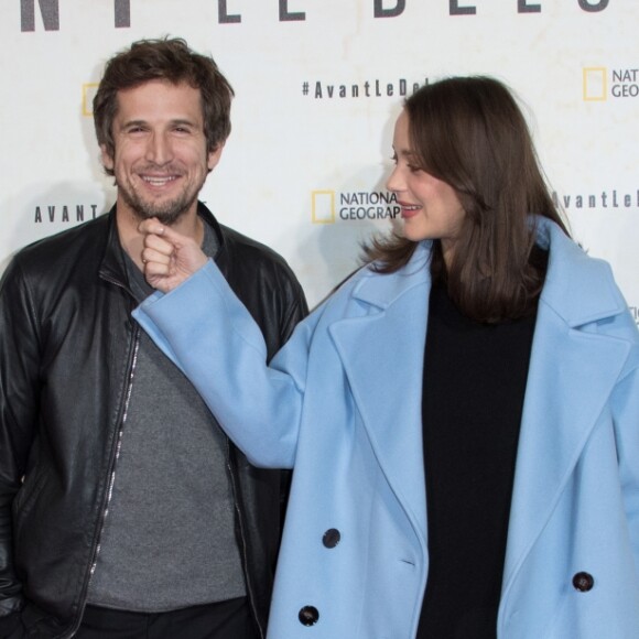 Marion Cotillard, enceinte, et son compagnon Guillaume Canet - Avant première du documentaire "Before the flood" au théâtre du Châtelet à Paris le 17 octobre 2016. © Cyril Moreau/Bestimage