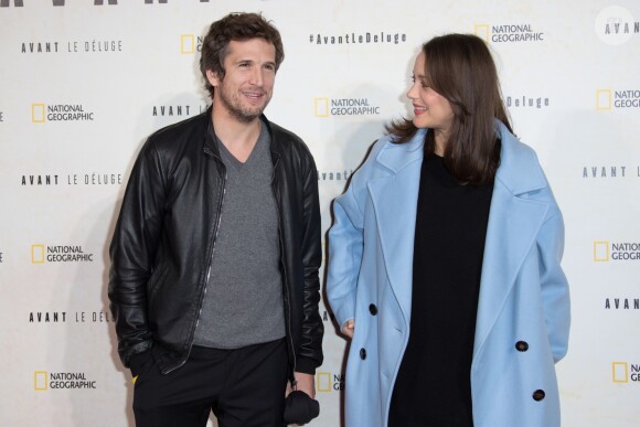 Marion Cotillard, enceinte, et son compagnon Guillaume Canet - Avant première du documentaire "Before the flood" au théâtre du Châtelet à Paris le 17 octobre 2016. © Cyril Moreau/Bestimage