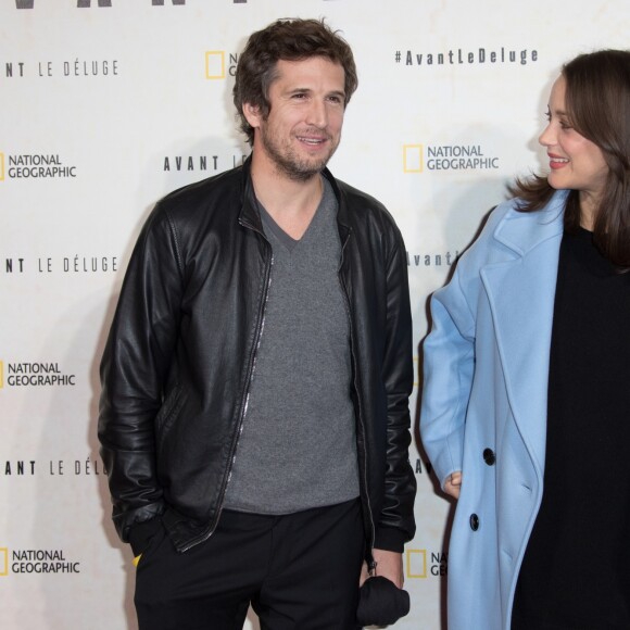 Marion Cotillard, enceinte, et son compagnon Guillaume Canet - Avant première du documentaire "Before the flood" au théâtre du Châtelet à Paris le 17 octobre 2016. © Cyril Moreau/Bestimage