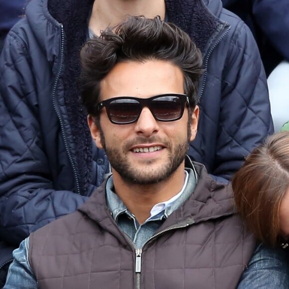 Maxim Nucci (Yodelice) et Isabelle Ithurburu dans les tribunes des Internationaux de France de tennis de Roland-Garros à Paris. Le 24 mai 2016 © Dominique Jacovides / Bestimage