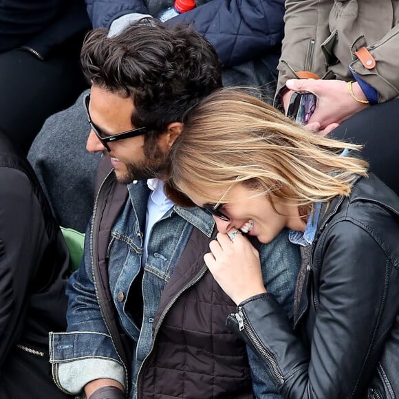 Maxim Nucci (Yodelice) et Isabelle Ithurburu dans les tribunes des Internationaux de France de tennis de Roland-Garros à Paris. Le 24 mai 2016 © Dominique Jacovides / Bestimage