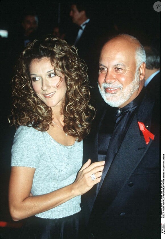 René Angélil et Céline Dion assistente à la cérémonie des People's choice Awards, à Los Angeles, le 9 août 1999.