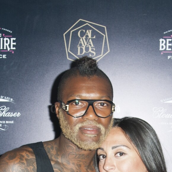 Djibril Cissé et sa compagne Marie-Cécile au Calavados pendant le 68 ème festival du film de Cannes le 17 mai 2015.