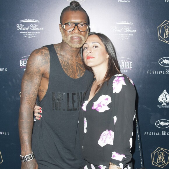 Djibril Cissé et sa compagne Marie-Cécile au Calavados pendant le 68 ème festival du film de Cannes le 17 mai 2015.
