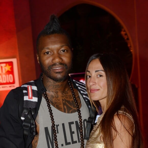 Djibril Cissé et sa compagne Marie-Cécile Lenzini à l'after-party de la clôture du Marrakech du rire au Cristal Pacha, le 14 juin 2014.