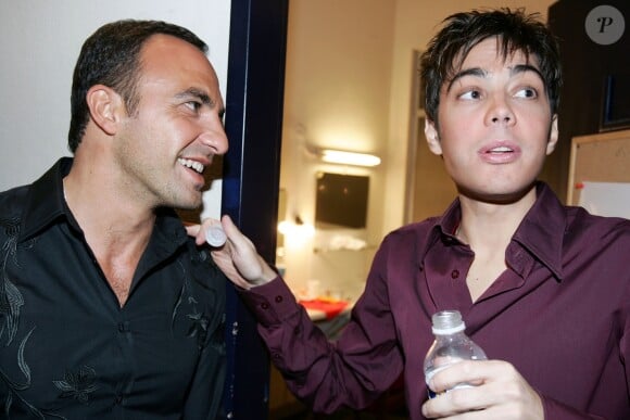 Grégory Lemarchal et Nikos Aliagas assistent au concert "Make a Wish" organisé à Bruxelles le 15 novembre 2006.