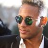 Le footballeur Neymar sort du palais de justice de Madrid, le 2 février 2016, où il était cité a comparaître devant un juge d'instruction en vue de son inculpation d'escroquerie.