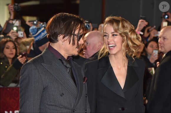 Johnny Depp et sa fiancée Amber Heard - Première du film "Charlie Mortdecai" à l'Empire, Leicester Square, à Londres, le 19 janvier 2015.