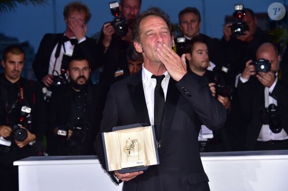 Vincent Lindon (prix d'interprétation masculine pour le film "La Loi du Marché") - Photocall de la remise des palmes du 68e Festival du film de Cannes le 24 mai 2014