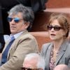 Isabelle Huppert et son mari à Roland Garros en juin 2012.