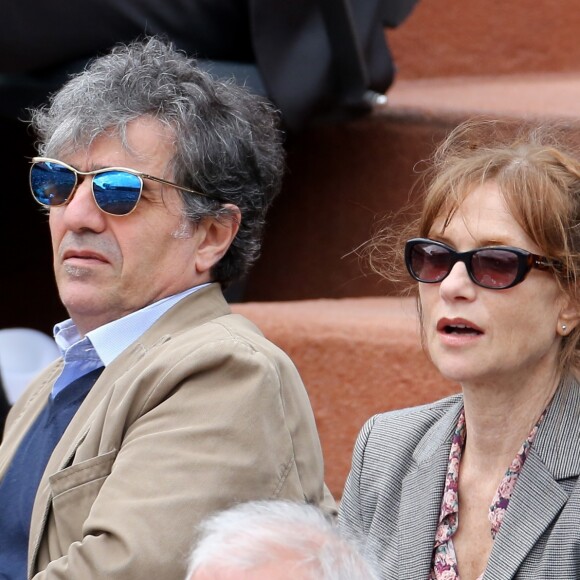 Isabelle Huppert et son mari à Roland Garros en juin 2012.