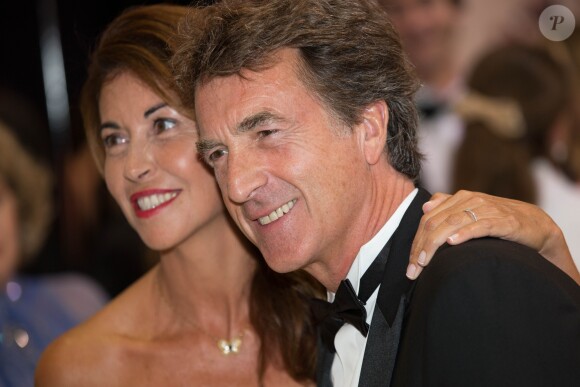 François Cluzet et sa femme Narjiss - 66ème Gala de la Croix Rouge Monégasque au Sporting de Monte-Carlo à Monaco, le 1er août 2014.