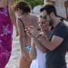 Exclusif - Ashley Greene et son compagnon Paul Khoury sur la plage à Cancun, le 23 novembre 2014.