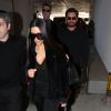 Kim Kardashian et Scott Disick arrivent à l'aéroport de Los Angeles le 11 janvier 2017.