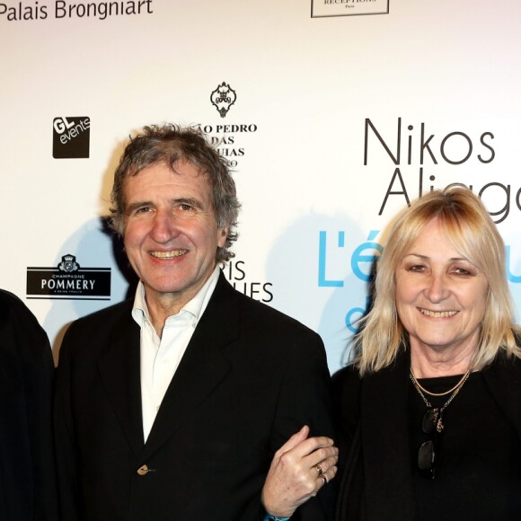 Pierre Gagnaire, Gérard Leclerc, sa femme Julie et Nikos Aliagas - Vernissage de l'exposition "L'épreuve du Temps" de Nikos Aliagas au Palais Brongniart à Paris, le 16 janvier 2017.