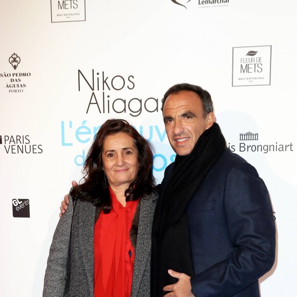 Patricia Houg (commissaire de l'exposition) et Nikos Aliagas - Vernissage de l'exposition "L'épreuve du Temps" de Nikos Aliagas au Palais Brongniart à Paris, le 16 janvier 2017.