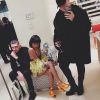 Anthony Alcaraz des "Anges 9" avec le styliste Scot Louie et la petite fille de Magic Johnson Elisa à New-York, janvier 2017