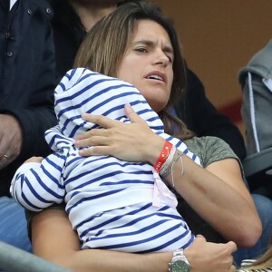 Amélie Mauresmo et son fils Aaron Mauresmo lors du match du quart de finale de l'UEFA Euro 2016 France-Islande au Stade de France à Saint-Denis, France le 3 juillet 2016. © Cyril Moreau/Bestimage