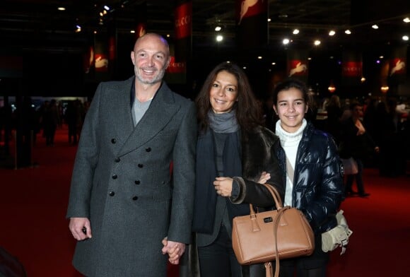 Frank Leboeuf avec sa compagne Chrislaure Nollet (ex-femme de Fabrice Santoro) et la fille de celle-ci Djenae au Gucci Paris Masters 2013 a Villepinte le 8 decembre 2013.
