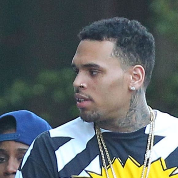 Exclusif - Chris Brown, Karrueche Tran - Chris Brown, sa compagne et leurs amis quittent l'hôtel SLS à Beverly Hills. Le 20 juin 2014.