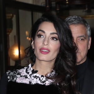 George Clooney et sa femme Amal Alamuddin (enceinte) quittent leur hôtel, L'Hôtel, pour aller dîner au restaurant Lapérouse à Paris. Le 25 février 2017