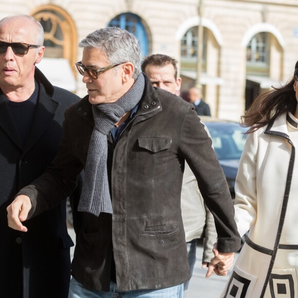 George Clooney et sa femme Amal Alamuddin enceinte (tenue William Vintage) arrivent au Ritz à Paris. Le 25 février 2017