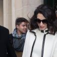 George Clooney et sa femme Amal Alamuddin enceinte (tenue William Vintage) à la sortie de leur hôtel, L'Hôtel, à Paris. Le 25 février 2017