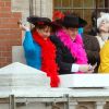 Les ministres Ségolène Royal et Patrick Kanner participent au traditionnel lancer de harengs depuis le balcon de l'hotel de ville à l'occasion du Caranaval de Dunkerque, le 26 février 2017
